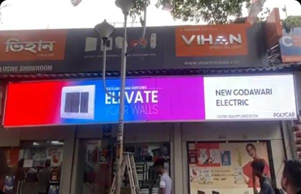 ACP board signage installation at retail store